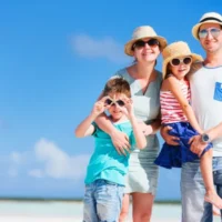 depositphotos_39582193-stock-photo-family-vacation-portrait 