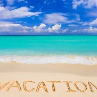 depositphotos_4235695-stock-photo-word-vacation-on-beach 